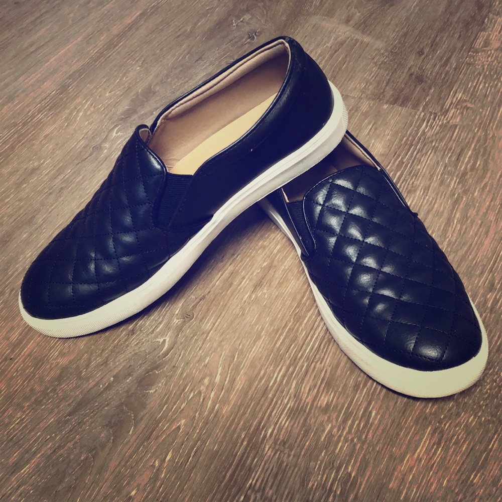 Comfortable and stylish black quilted slip ons.